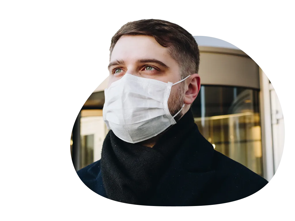 A man wearing a medical mask to represent COVID-19